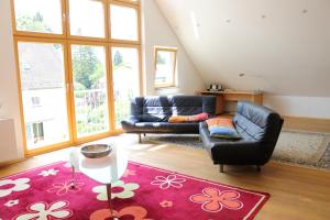 Posezení v ubytování Apartment Dachgalerie 110 m2