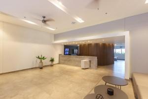 Μια τηλεόραση ή/και κέντρο ψυχαγωγίας στο U-GO Edificio Ambar Roca en Rodadero Sur