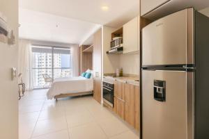 Η κουζίνα ή μικρή κουζίνα στο U-GO Edificio Ambar Roca en Rodadero Sur