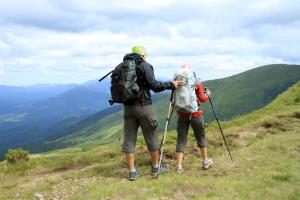 two people standing on top of a mountain at Gite de La Lauzeraie in La Bourboule