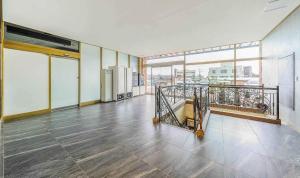 an empty room with a large window and a large floor at Yeongjong Stay Hotel in Incheon