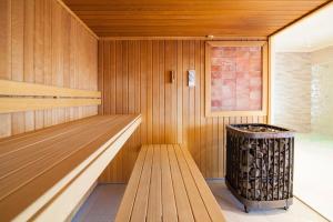 an empty sauna with a trash can in it at Eden Resort & Spa in Mielno +84 photos
