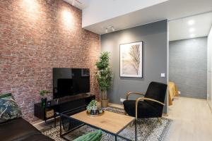 Et tv og/eller underholdning på City Home Alvari, ilmainen pysäköinti lämpimässä autohallissa, free parking in warm garage