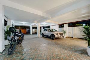 Fotografie z fotogalerie ubytování Super Townhouse OAK The Dev Regency v destinaci Patna + 38 fotografií