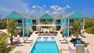 a view of a resort with a swimming pool at The Starfish at Cottages in Sand Bluff