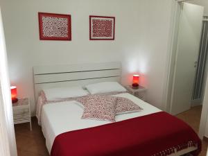 Cama ou camas em um quarto em Villa Cenzina