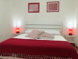 Cama ou camas em um quarto em Villa Cenzina