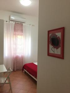 Cama ou camas em um quarto em Villa Cenzina