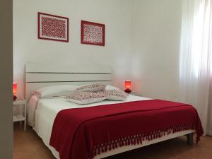 Cama ou camas em um quarto em Villa Cenzina
