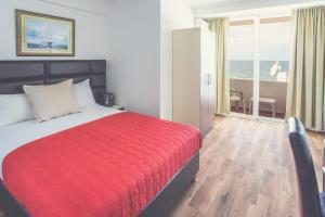 A bed or beds in a room at David apartments and rooms