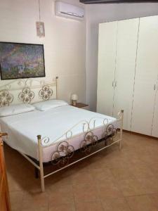 Postel nebo postele na pokoji v ubytování Casa Levante, air-conditioned, near the sea