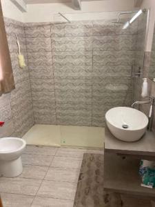 Koupelna v ubytování Casa Levante, air-conditioned, near the sea