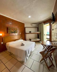 Postel nebo postele na pokoji v ubytování Varandas ao Mar Residencial