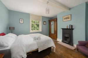 Ένα ή περισσότερα κρεβάτια σε δωμάτιο στο Chestnut House Sleeps 10