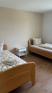 En eller flere senge i et værelse på Lina's Ferienwohnung