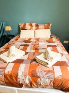 Postel nebo postele na pokoji v ubytování Le Sablésien 4 personnes,salon et cuisine entre centre ville et gare