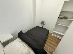 Ένα ή περισσότερα κρεβάτια σε δωμάτιο στο Habitacion privada con baño privado III