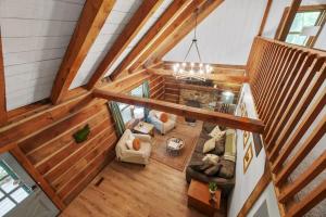 an overhead view of a living room in a house at Outdoors Sleeps7 Family Getaway Fun Arcade in Rockbridge