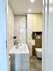 Et badeværelse på Glamour & City Apartamenty Radom