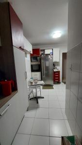 Η κουζίνα ή μικρή κουζίνα στο Apto mobiliado com quarto, sala, banheiro e cozinha