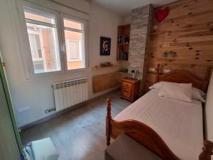 En eller flere senge i et værelse på La Vivienda de Morales