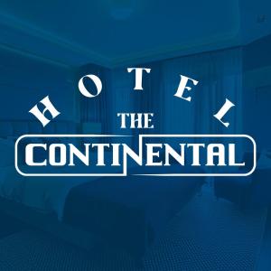 a sign with the words join the centennial at Hotel The Continental in Puerto Boyacá