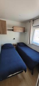 Postel nebo postele na pokoji v ubytování Bungalow neuf 6 places au calme, proche océan et lac