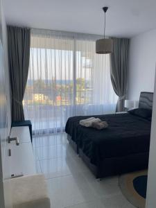 Ένα ή περισσότερα κρεβάτια σε δωμάτιο στο Northern Cyprus Iskele Bogaz Abelia One plus One Sea View