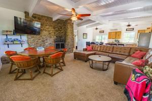 a living room with a couch and a table at Fairway Haven in Munds Park