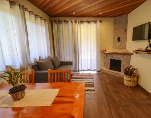 Et tv og/eller underholdning på Casa Raizes da Natureza