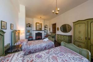 Posteľ alebo postele v izbe v ubytovaní Chalet Villa Ornella