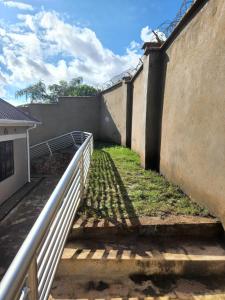 a set of stairs leading up to a building at Little Haven Stay in Mzuzu