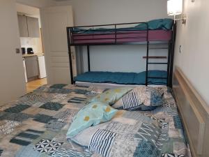 Ένα ή περισσότερα κρεβάτια σε δωμάτιο στο Auberge à la croisée gîte "La Marne"