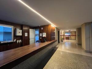 Lobi atau kawasan kaunter penerimaan di Duplex próximo ao metrô e aeroporto - área nobre