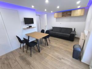 TV a/nebo společenská místnost v ubytování Apartment Feldkirch2