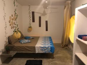 En eller flere senge i et værelse på Dana's Villa + 6 billeder