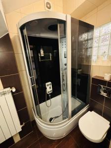 Ένα μπάνιο στο Apartament R48