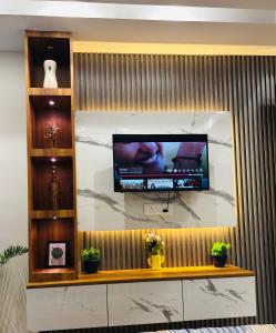 TV a/nebo společenská místnost v ubytování The Nook II