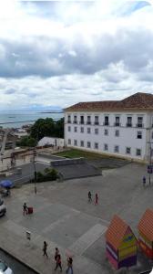 a group of people standing in front of a building at centro Historico Salvador in Salvador