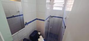 a bathroom with a shower and a toilet at Apartamento para Temporada em Guarulhos SP in Guarulhos +22 photos