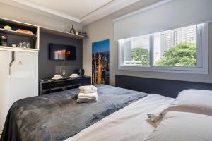 Postel nebo postele na pokoji v ubytování Apê business na Lapa com ar pertinho do Allianz + 20 fotografií