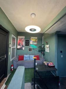 a living room with a couch and a table at Departamento Mateos 504 in Ciudad Acuña