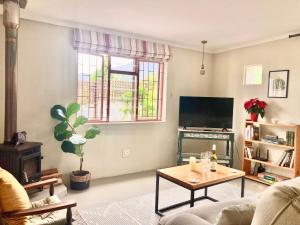 Et tv og/eller underholdning på Mijn Huis - Cottage Hideaway