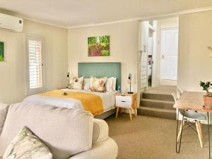 Et opholdsområde på Mijn Huis - Cottage Hideaway