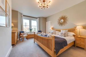 En eller flere senge i et værelse på Postmasters