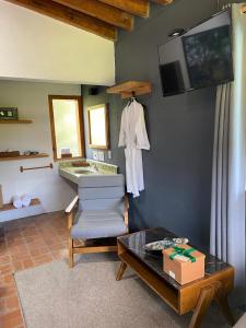 TV a/nebo společenská místnost v ubytování Orgánico Hotel Boutique VALLE DE BRAVO