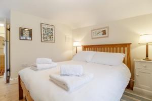 Postel nebo postele na pokoji v ubytování Wayfarer Cottage + 4 fotografie