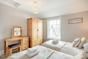 En eller flere senge i et værelse på Victoria Heights