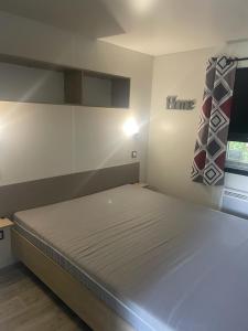 Katil atau katil-katil dalam bilik di Mobilhome MH04