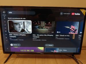 a tablet computer screen with a website on it at Apartament Bliżej Nieba in Bącza